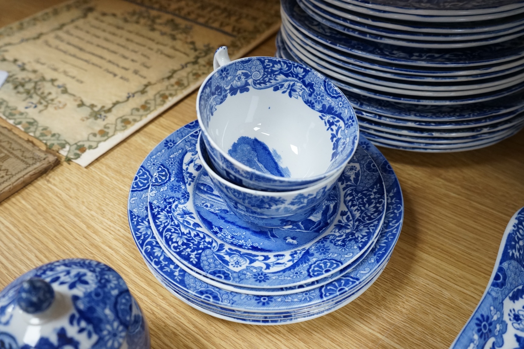 A Spode blue and white Italian service to include dinner plates, graduated bowls and platters, largest 37cm wide